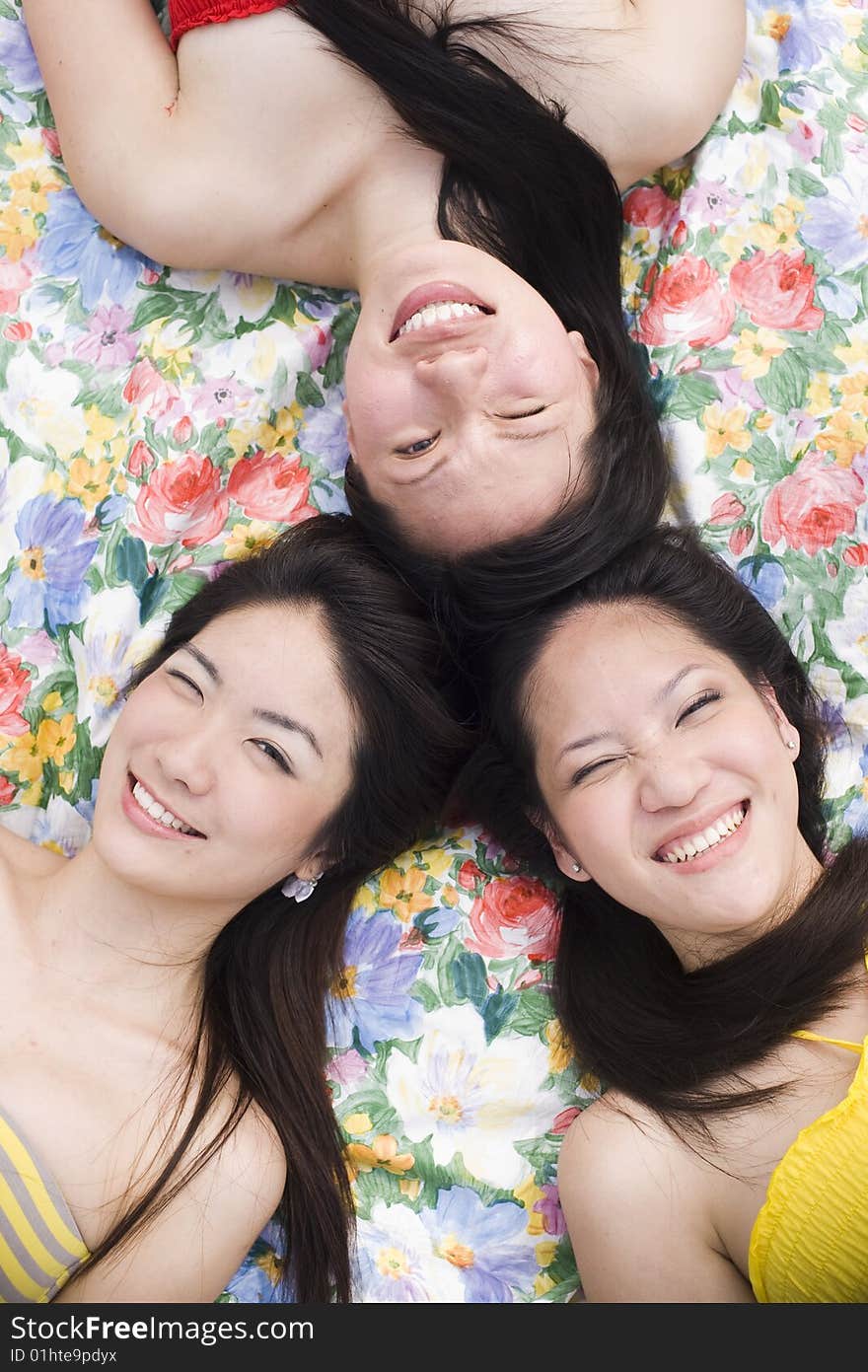 Happy girlfriends in the park