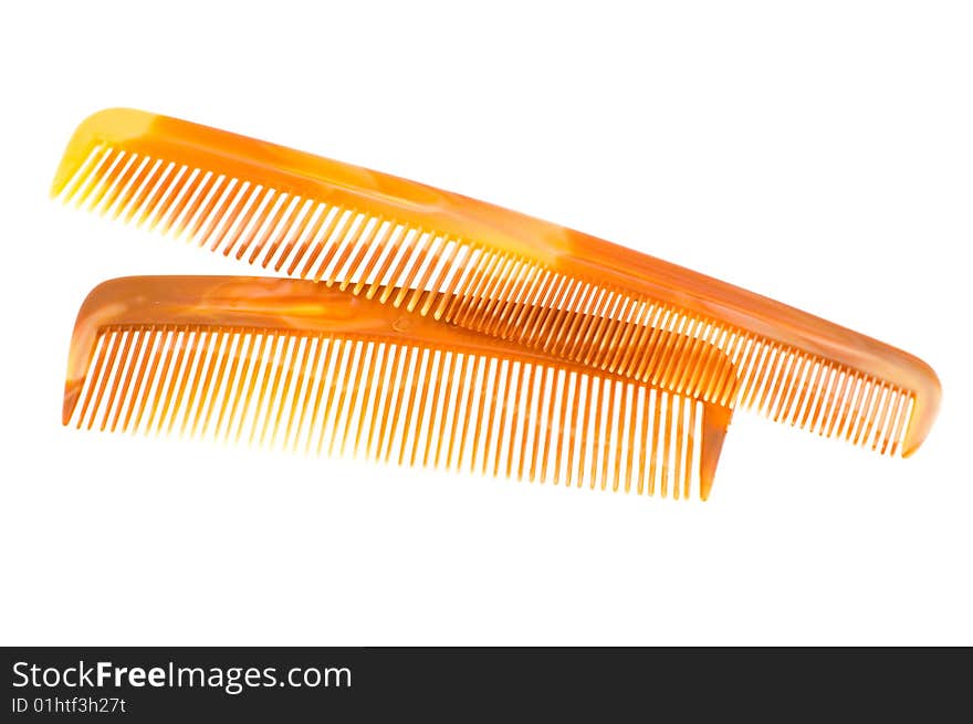 Two hairbrushes isolated on a white background