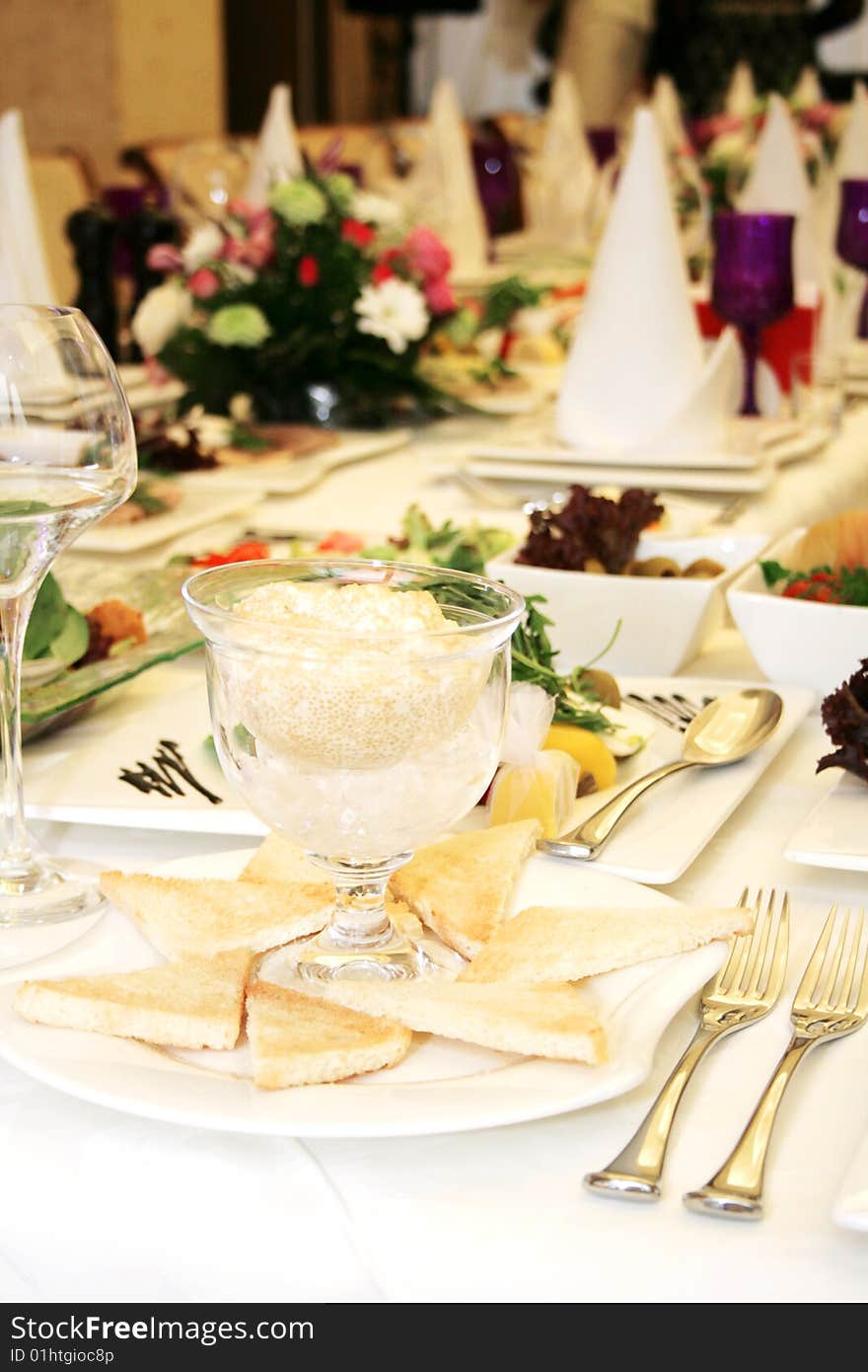 Caviar and toasts served on a banquet table