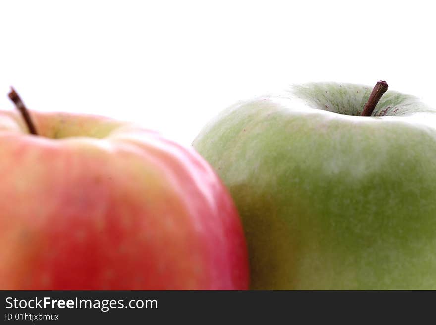 Red and yellow apples on white background