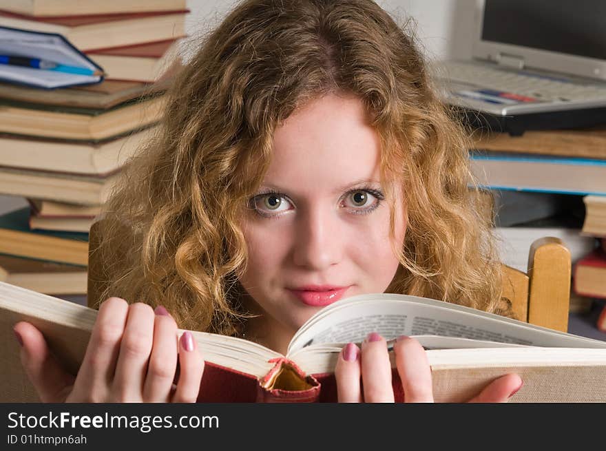 The woman and books.