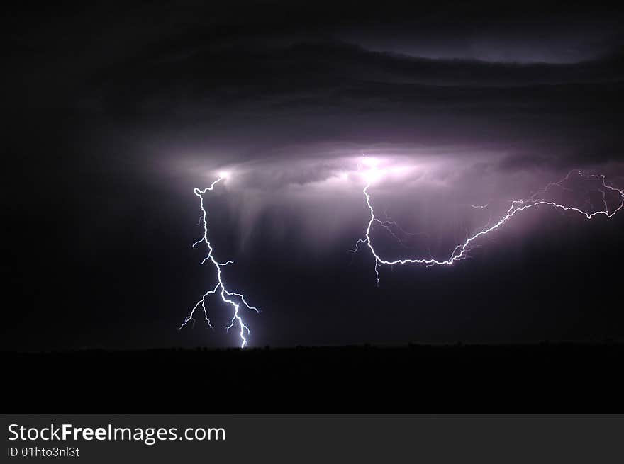 May lightning storm in open field. May lightning storm in open field