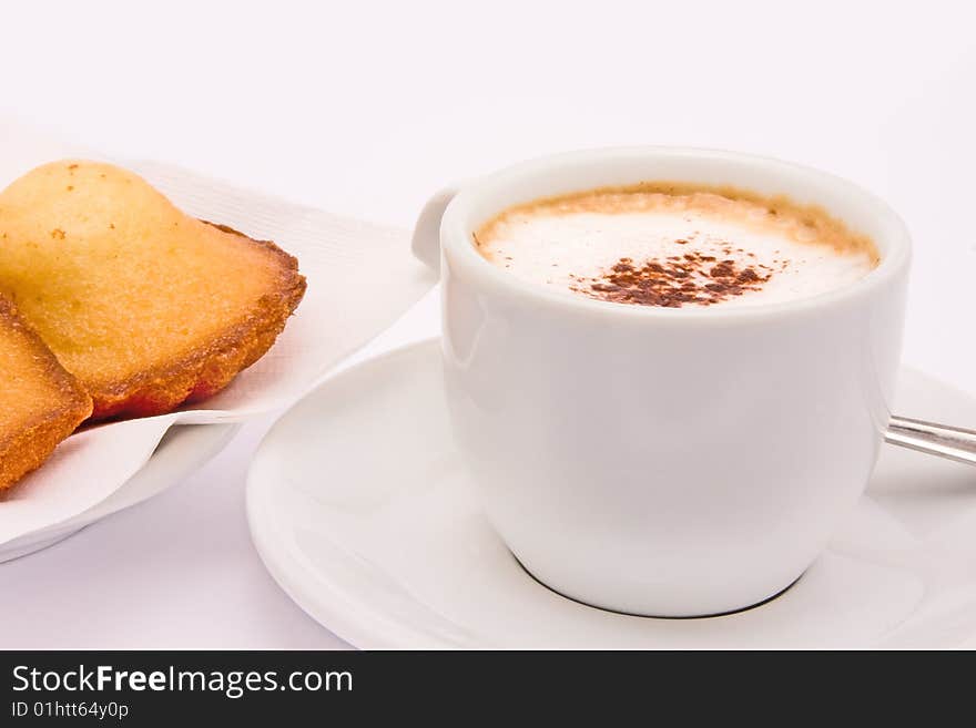 Cappuccino with so much foam delicious madeleine. Cappuccino with so much foam delicious madeleine