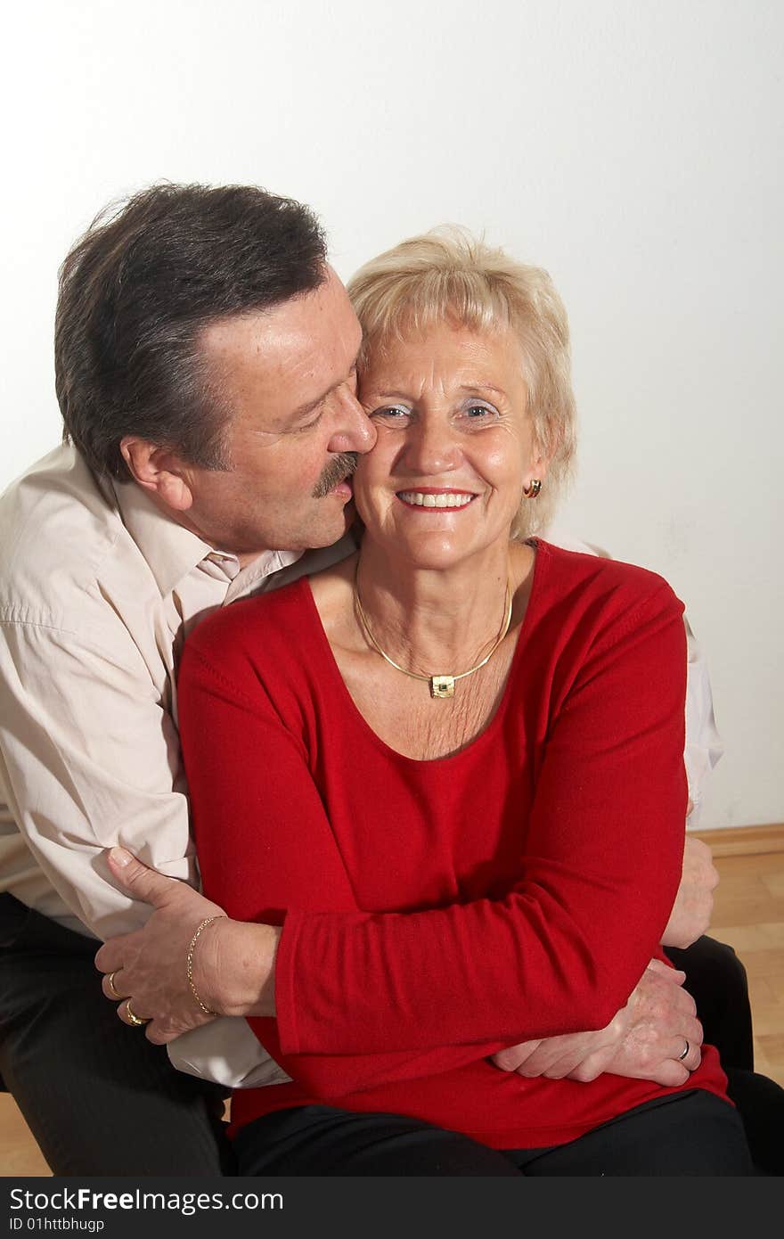 Happy old couple at home with copyspace. Happy old couple at home with copyspace.