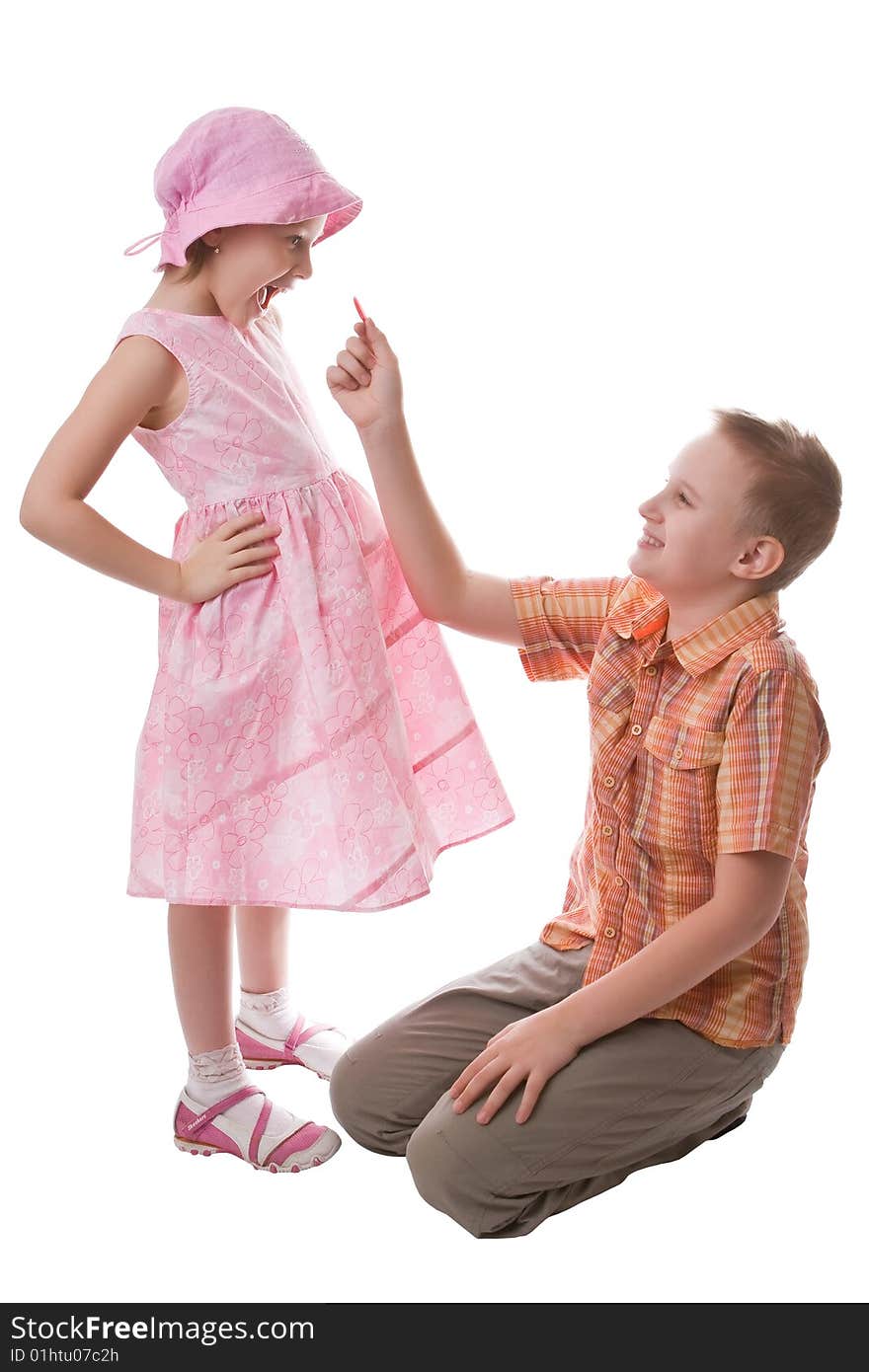 Little beautiful boy and girl isolated on a white background. Little beautiful boy and girl isolated on a white background