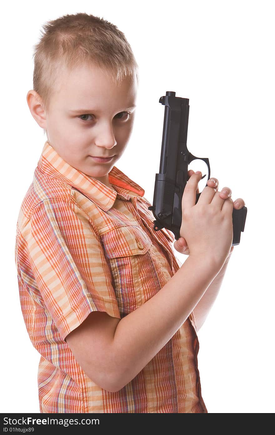 Boy with big gun isolated on a white background