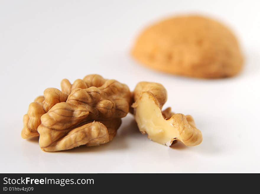 Walnut cracked out of shell isolated. Walnut cracked out of shell isolated