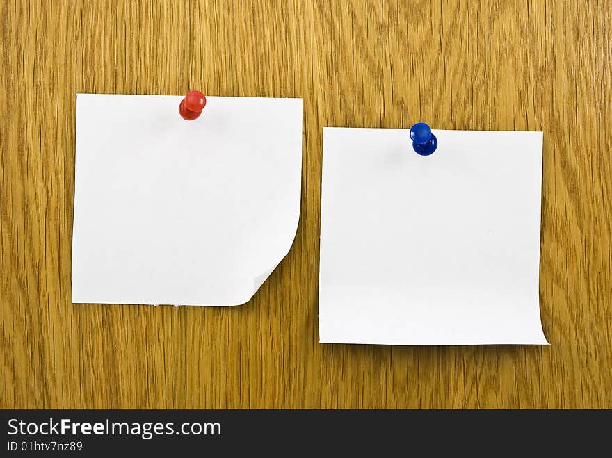 Reminders notes with pins on wooden background