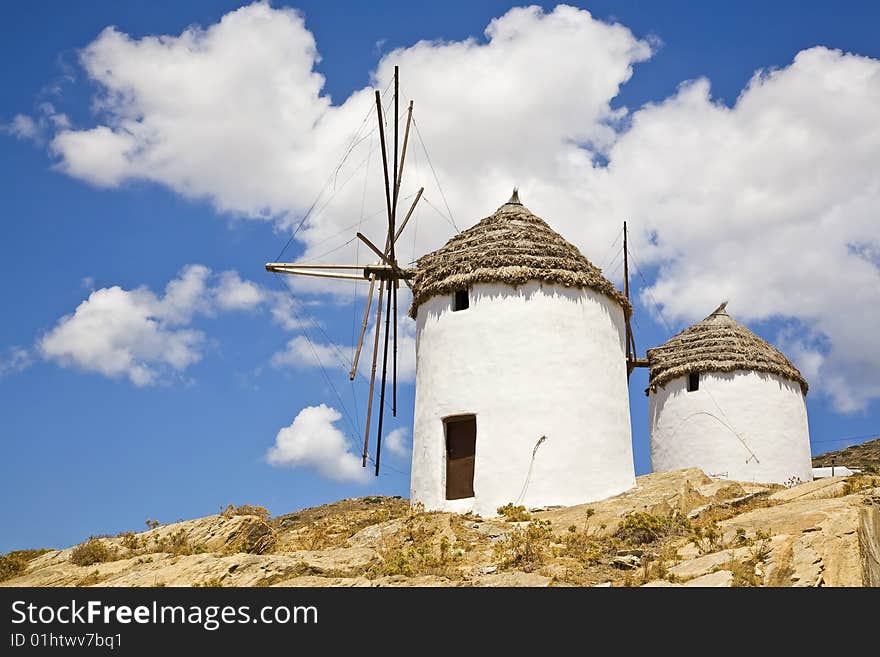 Two greek windmills on the island of Ios, Cyclades, Greece.