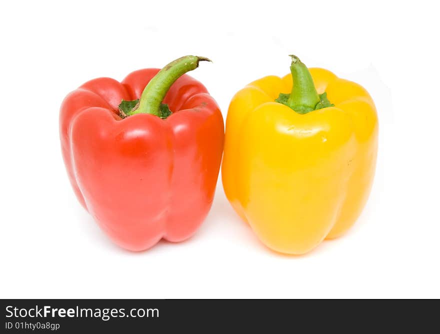 Red and yellow peppers isolated