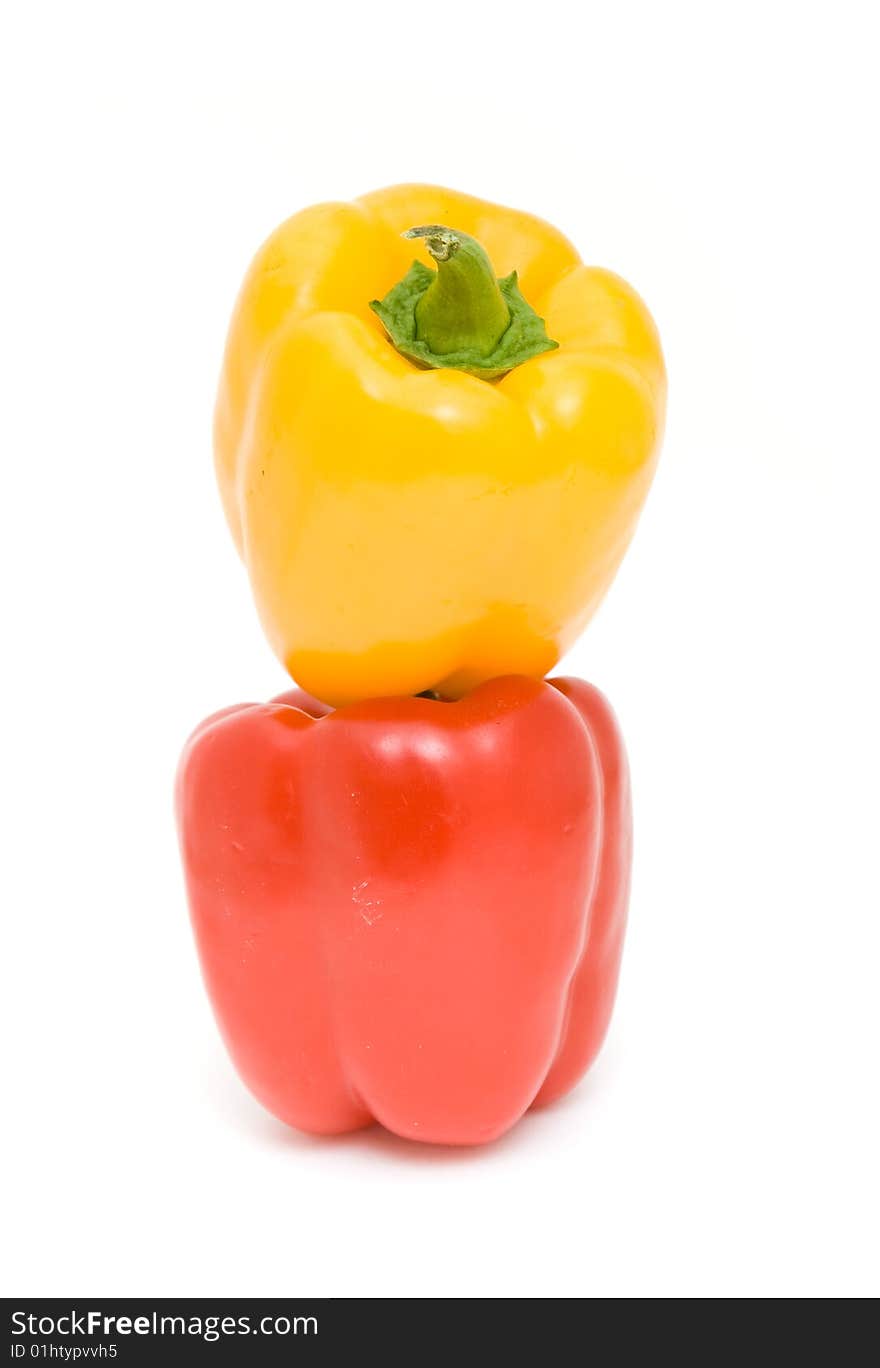 Red and yellow peppers isolated