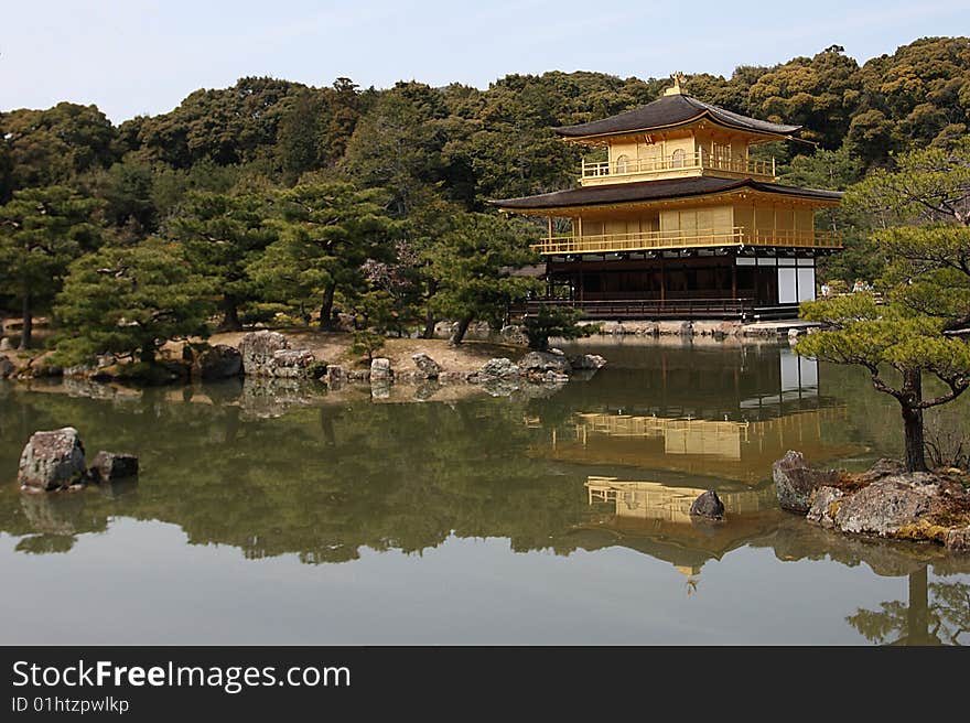 Deer-Garden Temple is also informally known as Kinkaku-ji or Golden Pavilion Temple. It is located in Kyoto, Japan. Deer-Garden Temple is also informally known as Kinkaku-ji or Golden Pavilion Temple. It is located in Kyoto, Japan.