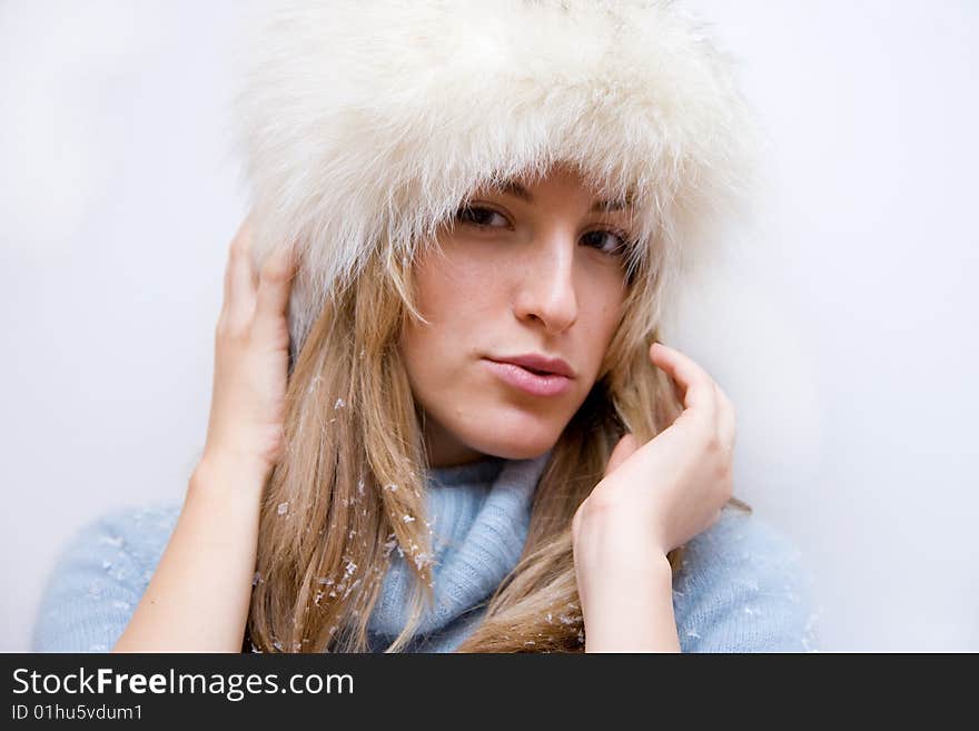 Portrait of girl in winter hat