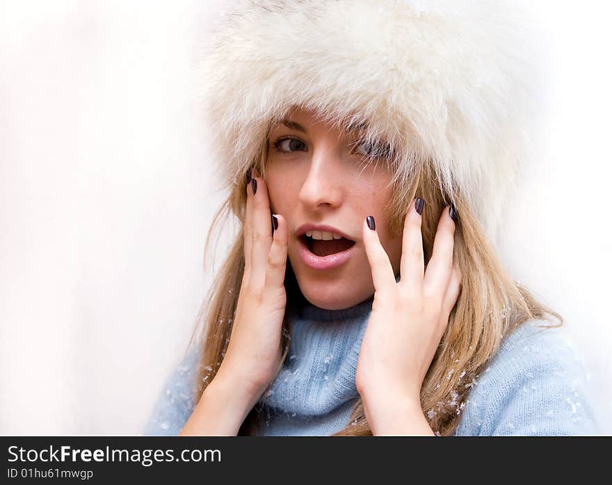 Portrait of girl in winter hat