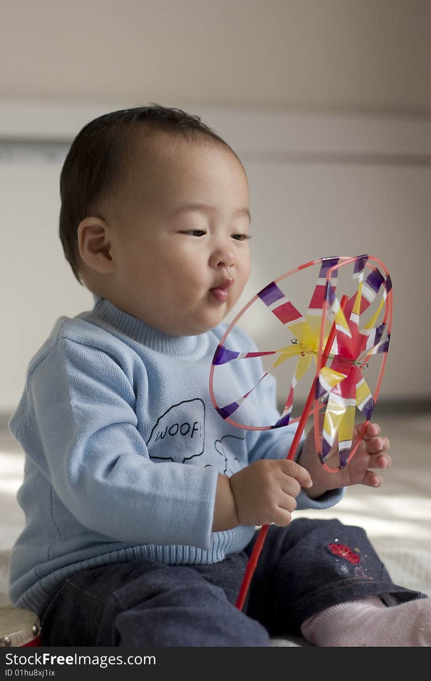 Lovely baby on bright background