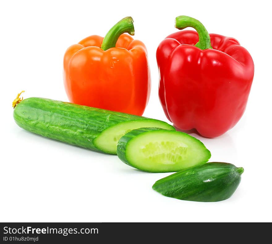 Fresh Vegetables (paprika and cucumber) isolated on a white background. Shot in a studio.