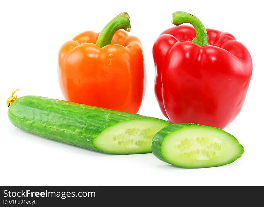 Fresh Vegetables (paprika and cucumber) isolated on a white background. Shot in a studio.