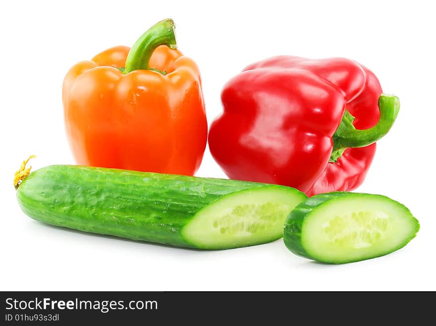 Fresh Vegetables (paprika and cucumber) isolated on a white background. Shot in a studio.