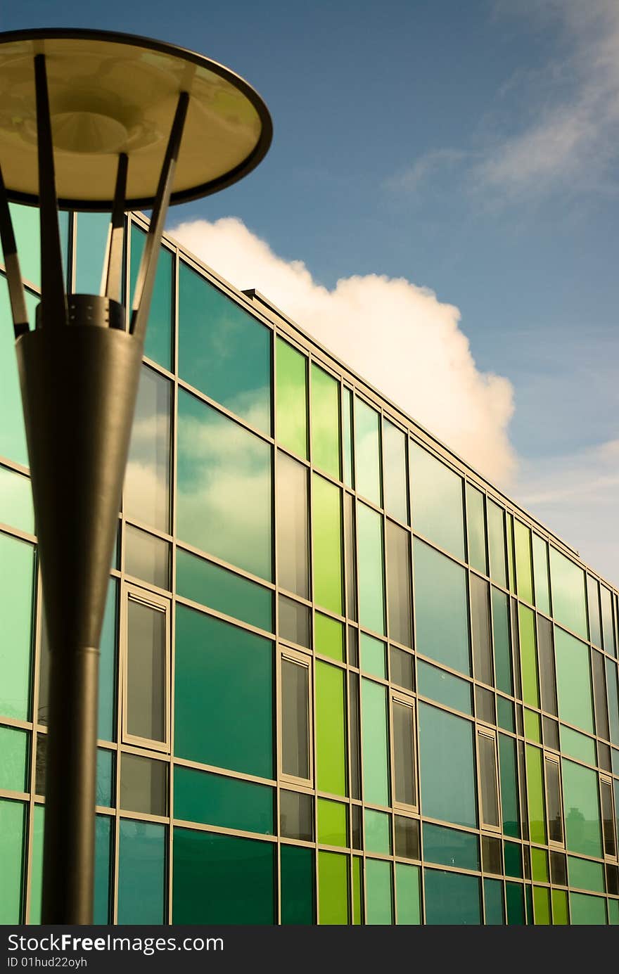 Brightly coloured modern building and streetlamp