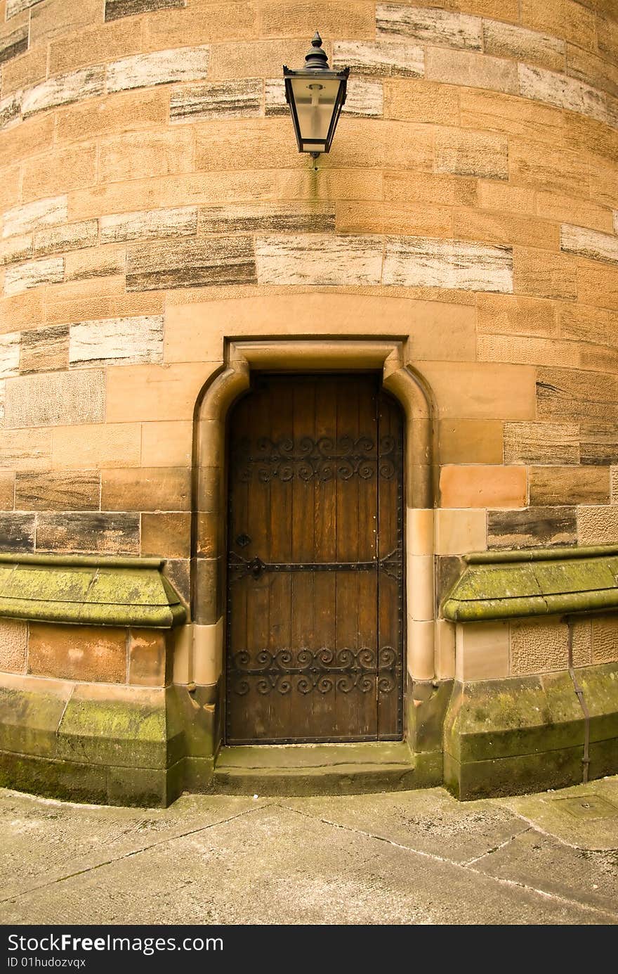 Detail of door and lamp of ancient building in Glasgow Scotland UK. Detail of door and lamp of ancient building in Glasgow Scotland UK