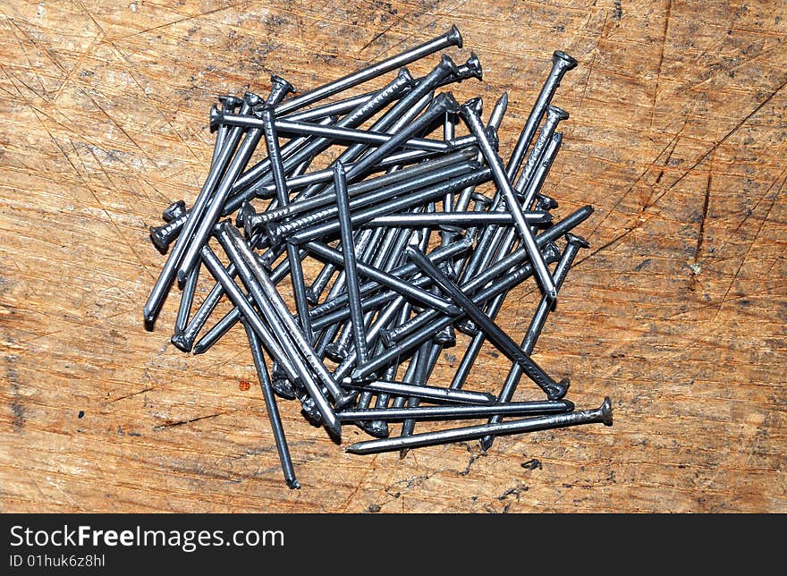 Nails on the wood board