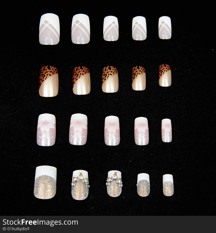 Different nails on a black table