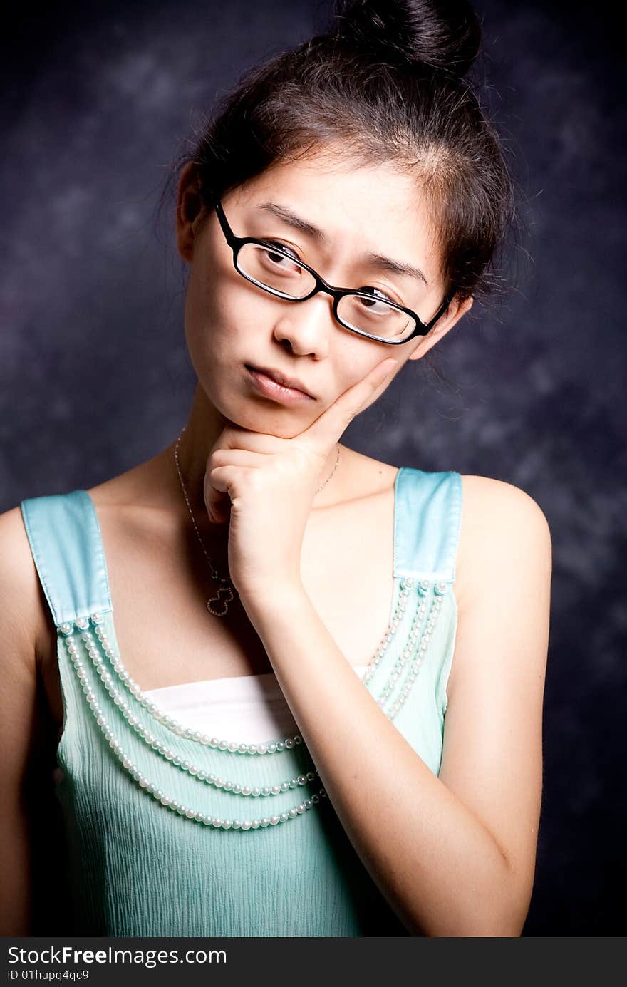 Chinese lady with hat and light green shirt. Chinese lady with hat and light green shirt