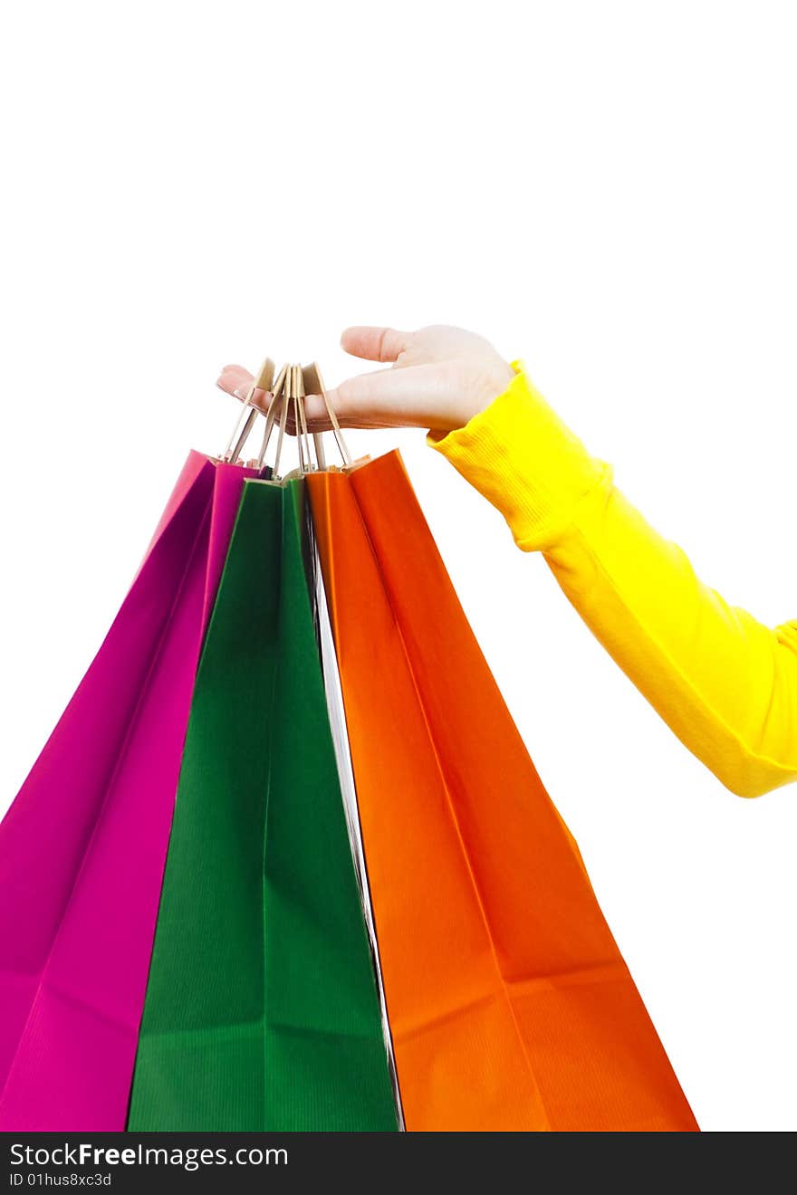 Woman's hand holding shopping bags