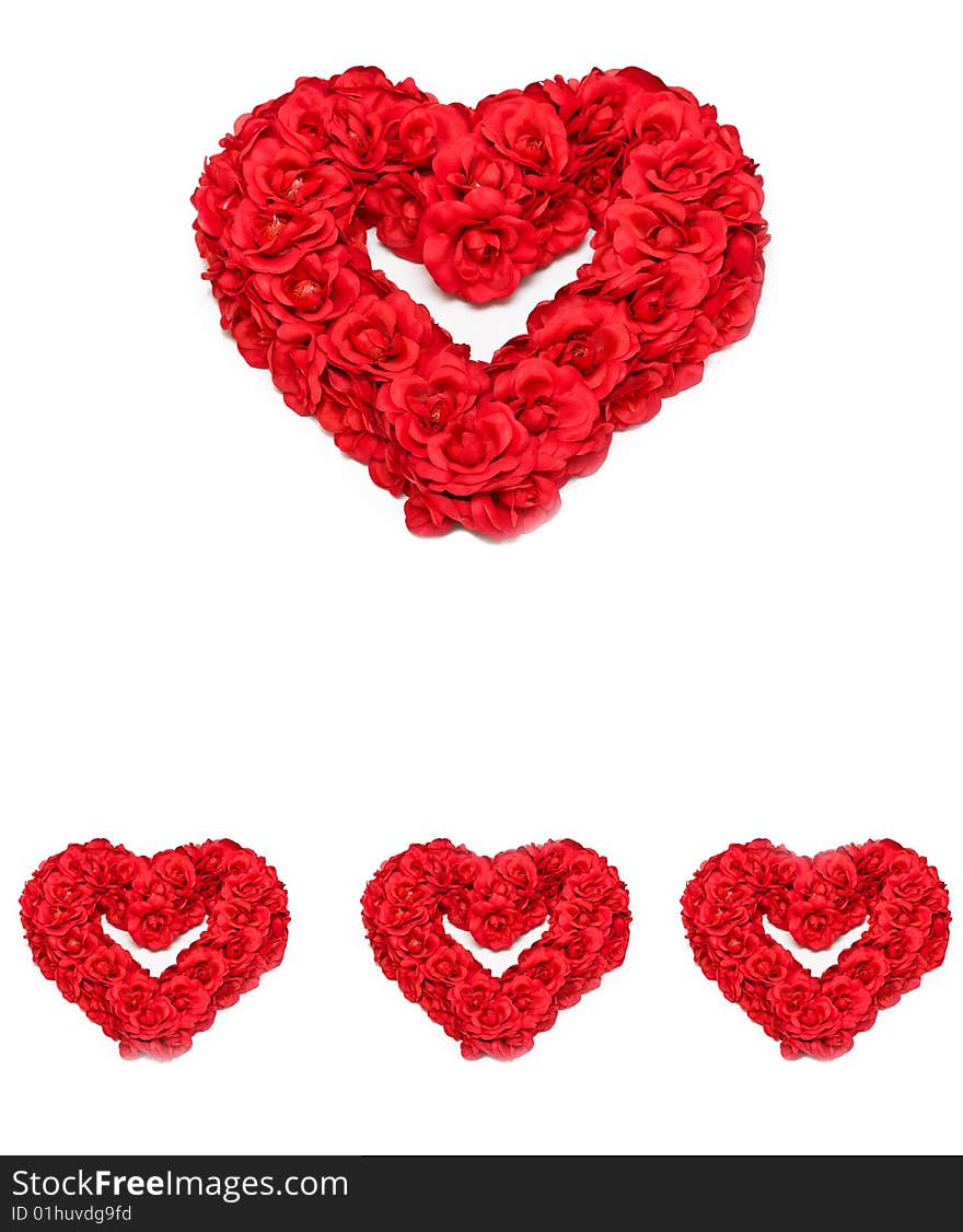 Red roses formed into heart-shaped wreathe. Red roses formed into heart-shaped wreathe.