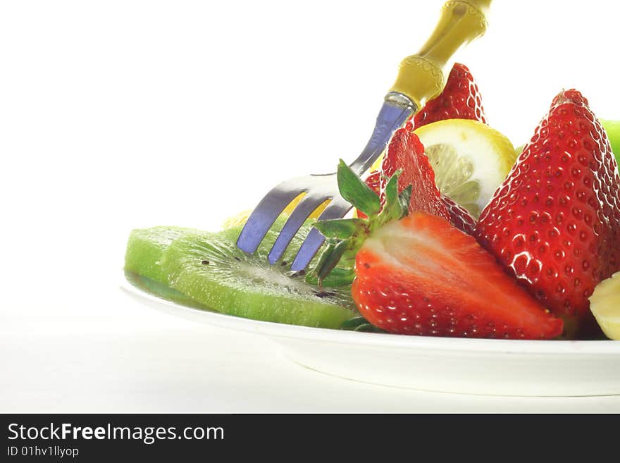 An isolated plate of fruit