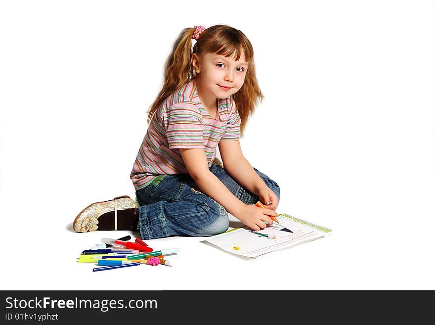 The girl draws on a white background