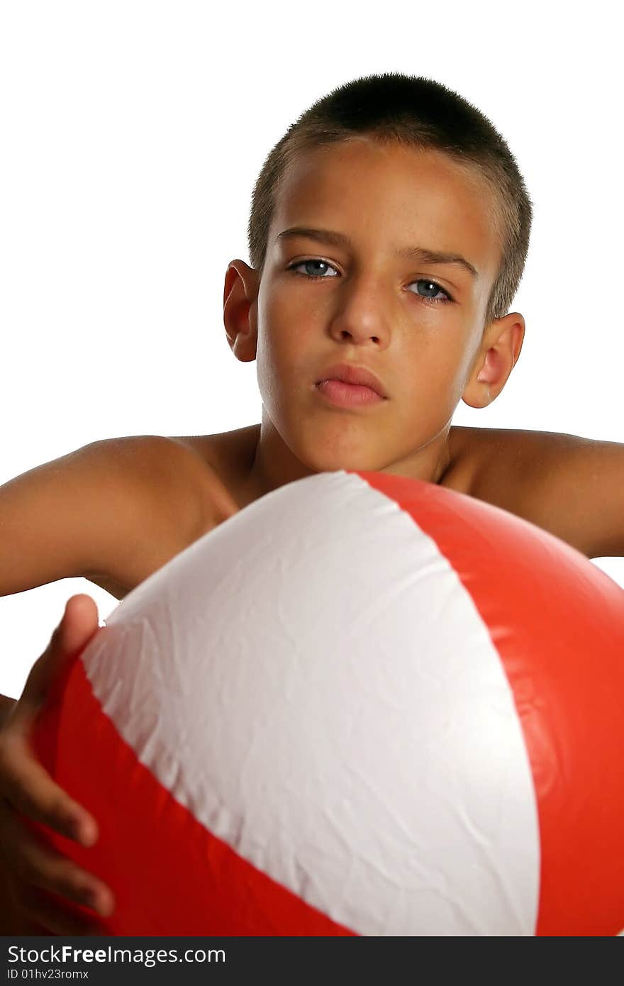 Boy with a big colorful beach ball. Boy with a big colorful beach ball