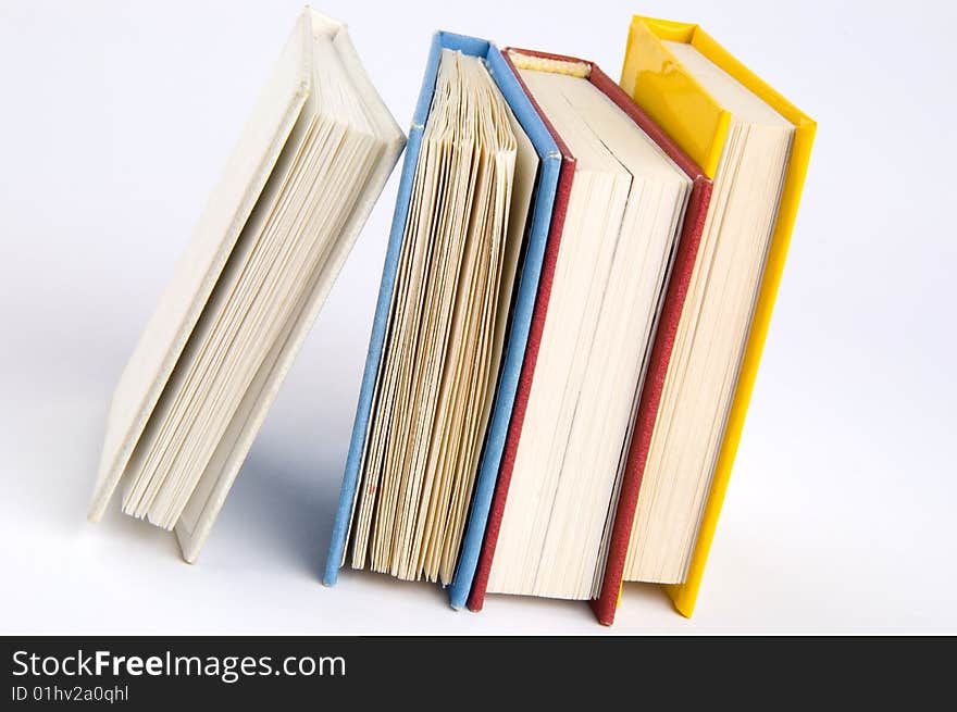 Isolated books stack on the desk