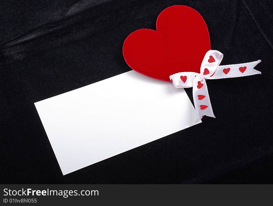 Red heart with empty card.