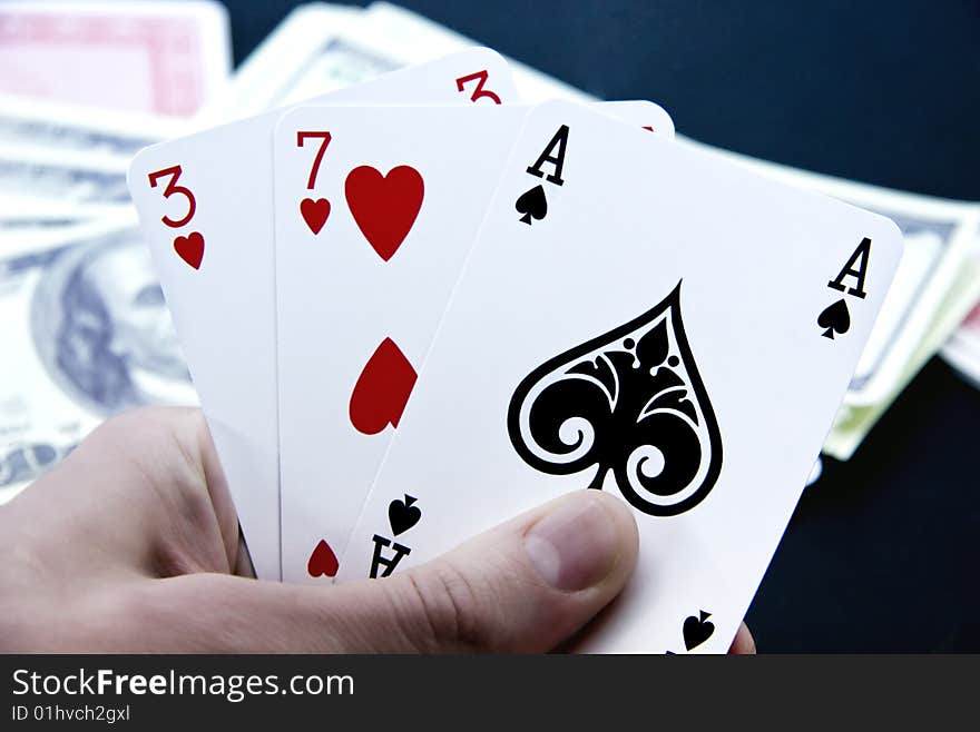 Playing cards in hand close up. Playing cards in hand close up