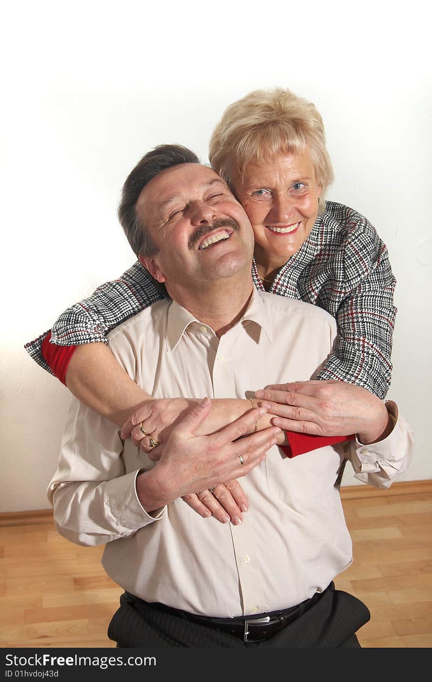 Happy old couple at home with copyspace. Happy old couple at home with copyspace.