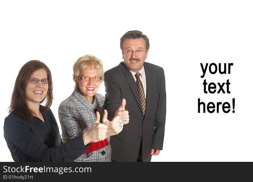 Small group of business people in business suits standing looking forward. Focus is on the young woman in front. Small group of business people in business suits standing looking forward. Focus is on the young woman in front.