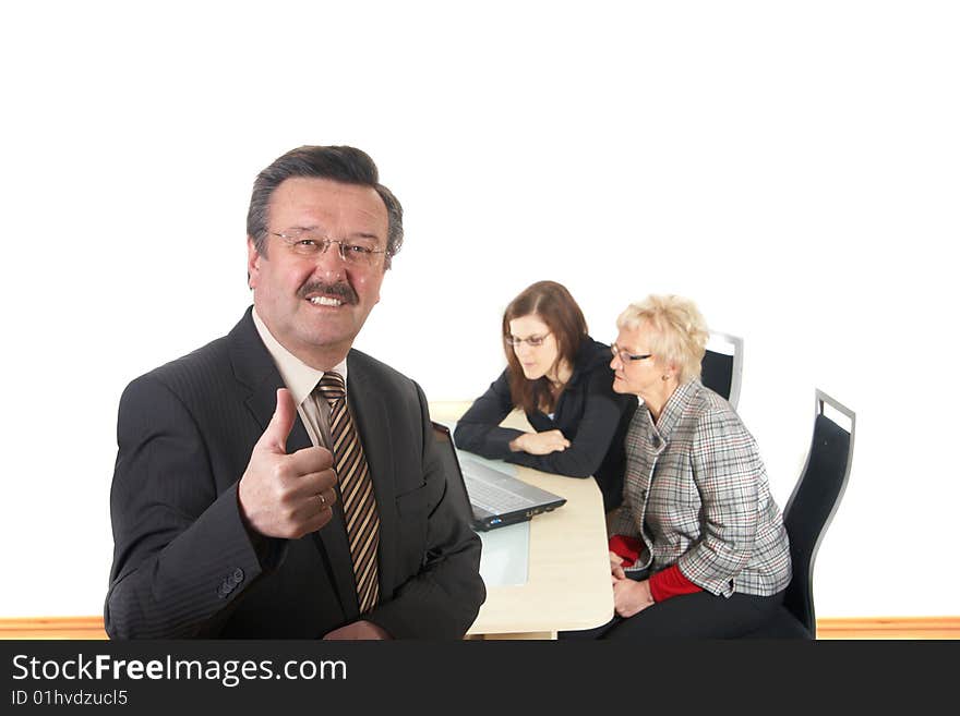 Businessman in office environment. Three people with focus on mature boss in front. Isolated over white. Businessman in office environment. Three people with focus on mature boss in front. Isolated over white.