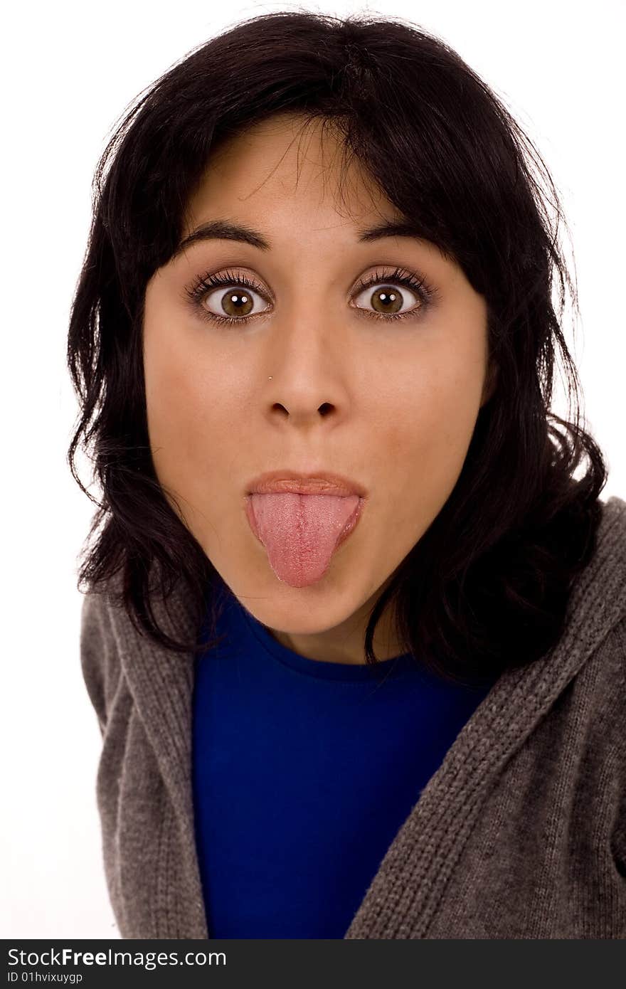 Beautiful casual girl showing tongue. Beautiful casual girl showing tongue