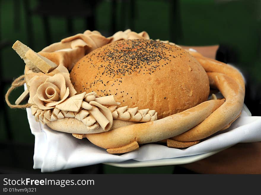 Decorated brown bread with poppy