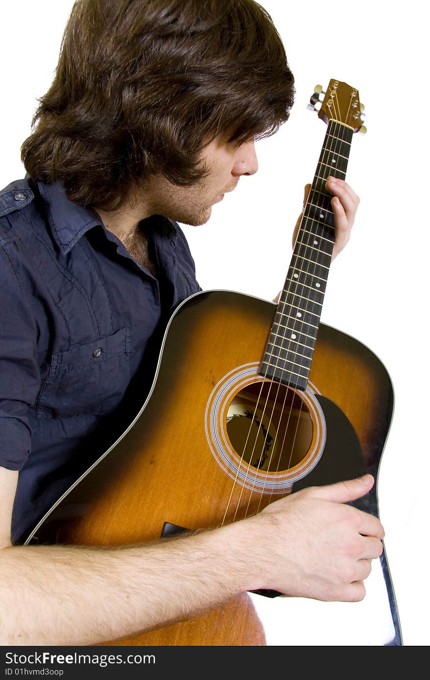 Guitarist playing an acoustic guitar