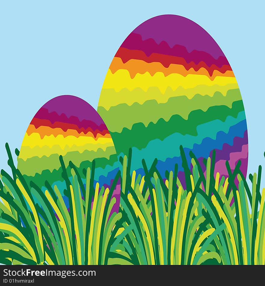 Two rainbow easter eggs hidden in the grass