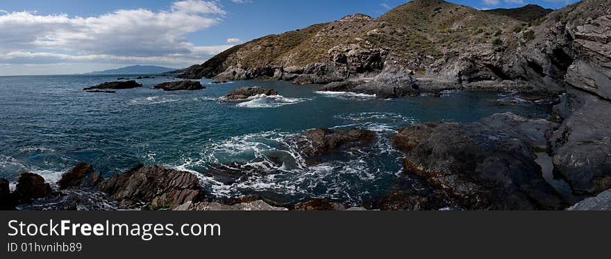 Rough sea panoramic view of the rocky coast of southern Spain. Rough sea panoramic view of the rocky coast of southern Spain