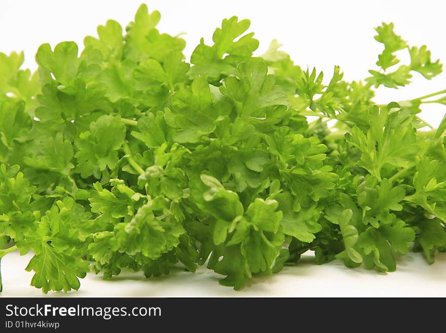 Bunch of parsley isolated on white.