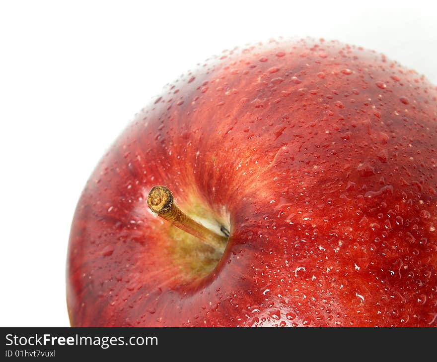 Detail of red apple covered with droplets of water. Detail of red apple covered with droplets of water