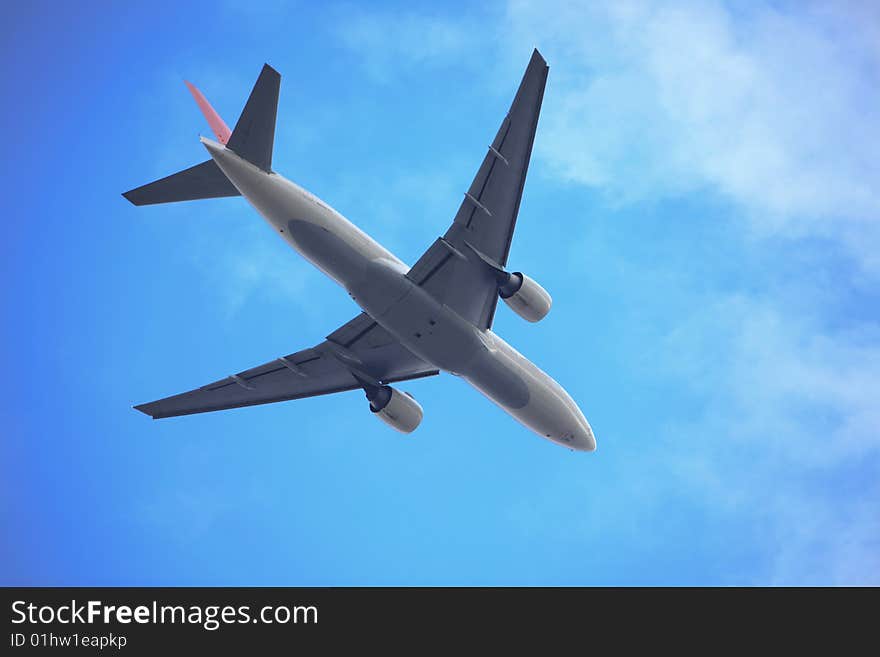 The airplane with blue sky.