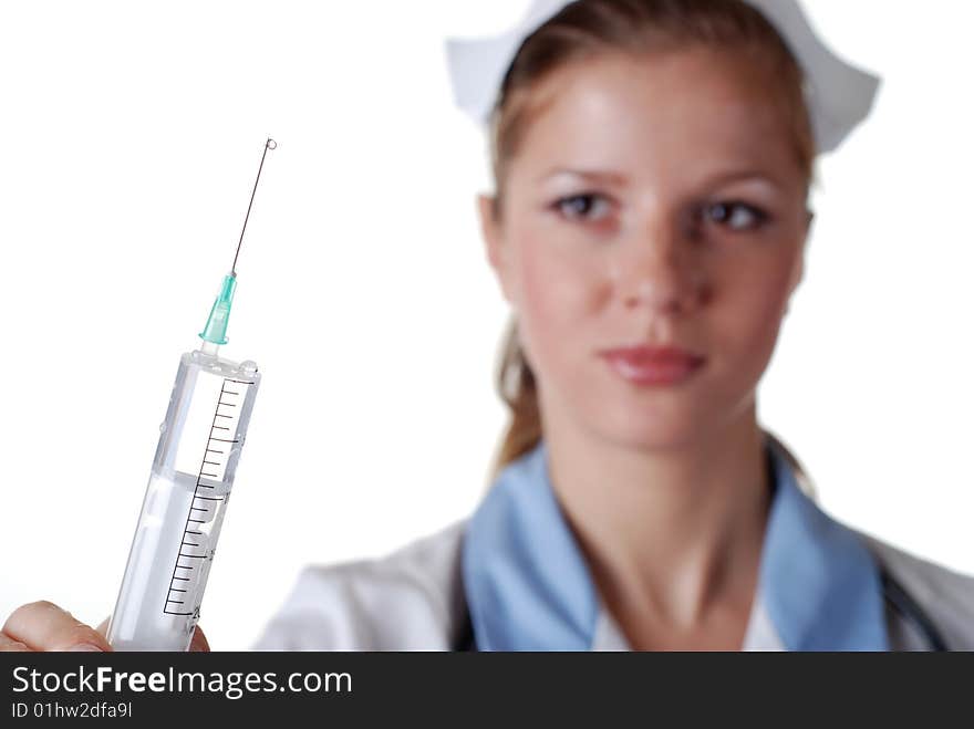 Beautiful nurse with syringe on white background