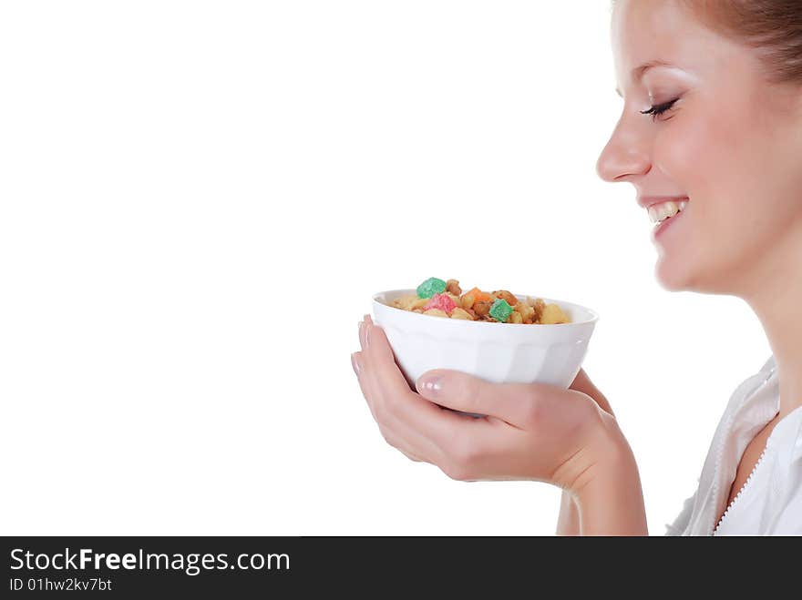 Portrait of young woman with plate of muesli. Portrait of young woman with plate of muesli