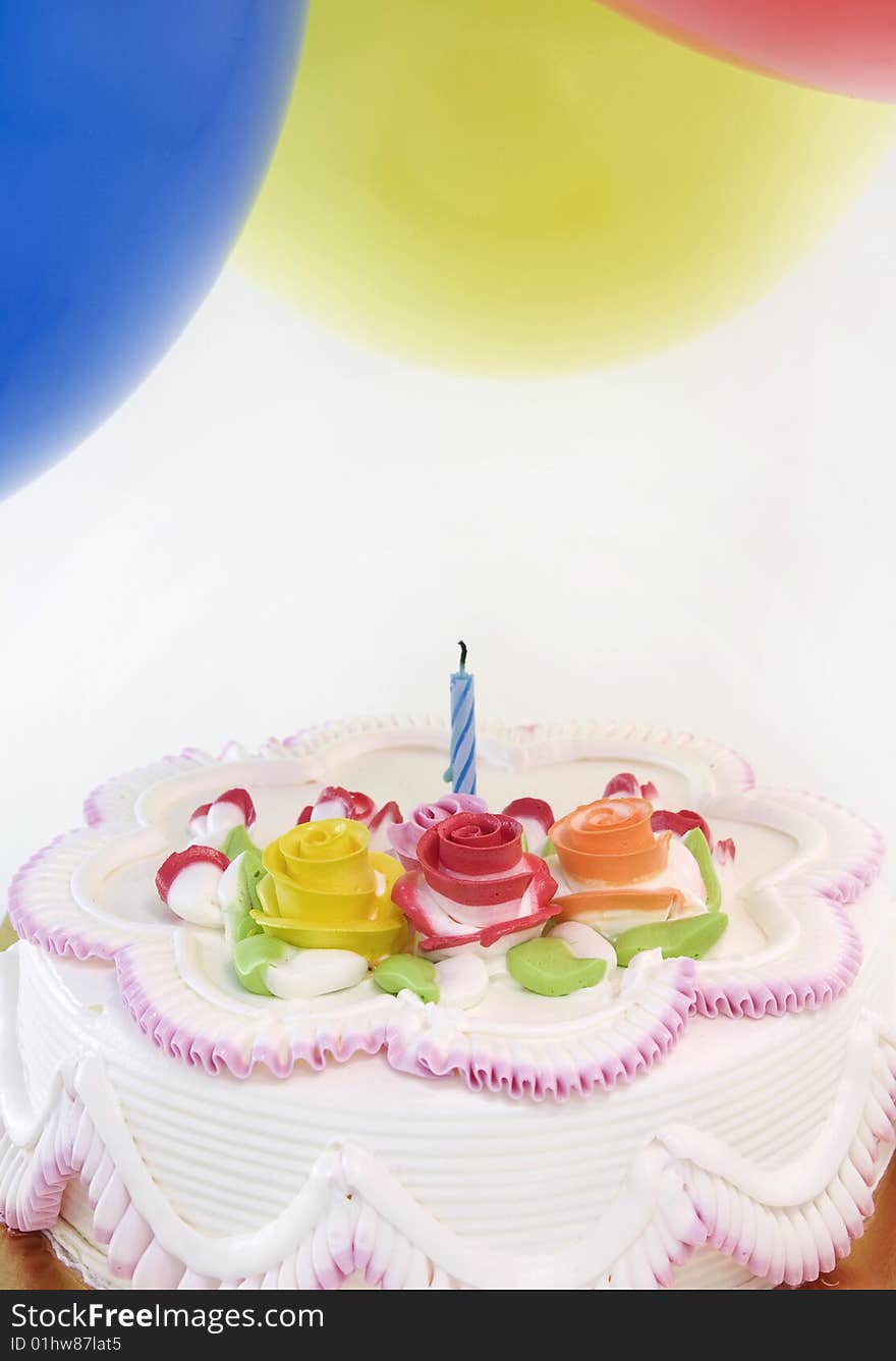 Birthday cake and balloons image