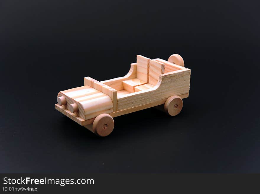 A wood car made by hand.